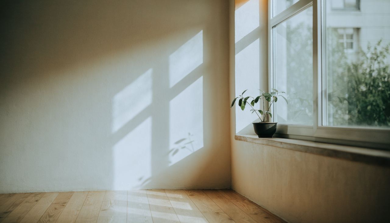 Sunlight striking a modern double-pane window with a Low-E coating